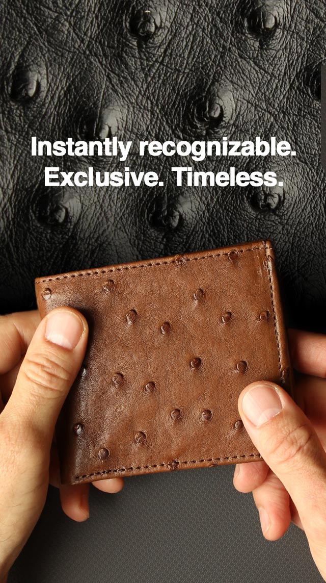 A man's hands holding a brown ostrich leather bifold wallet. In the background is a closeup view of black ostrich leather. The text over the image reads: Instantly recognizable. Luxurious. Timeless.